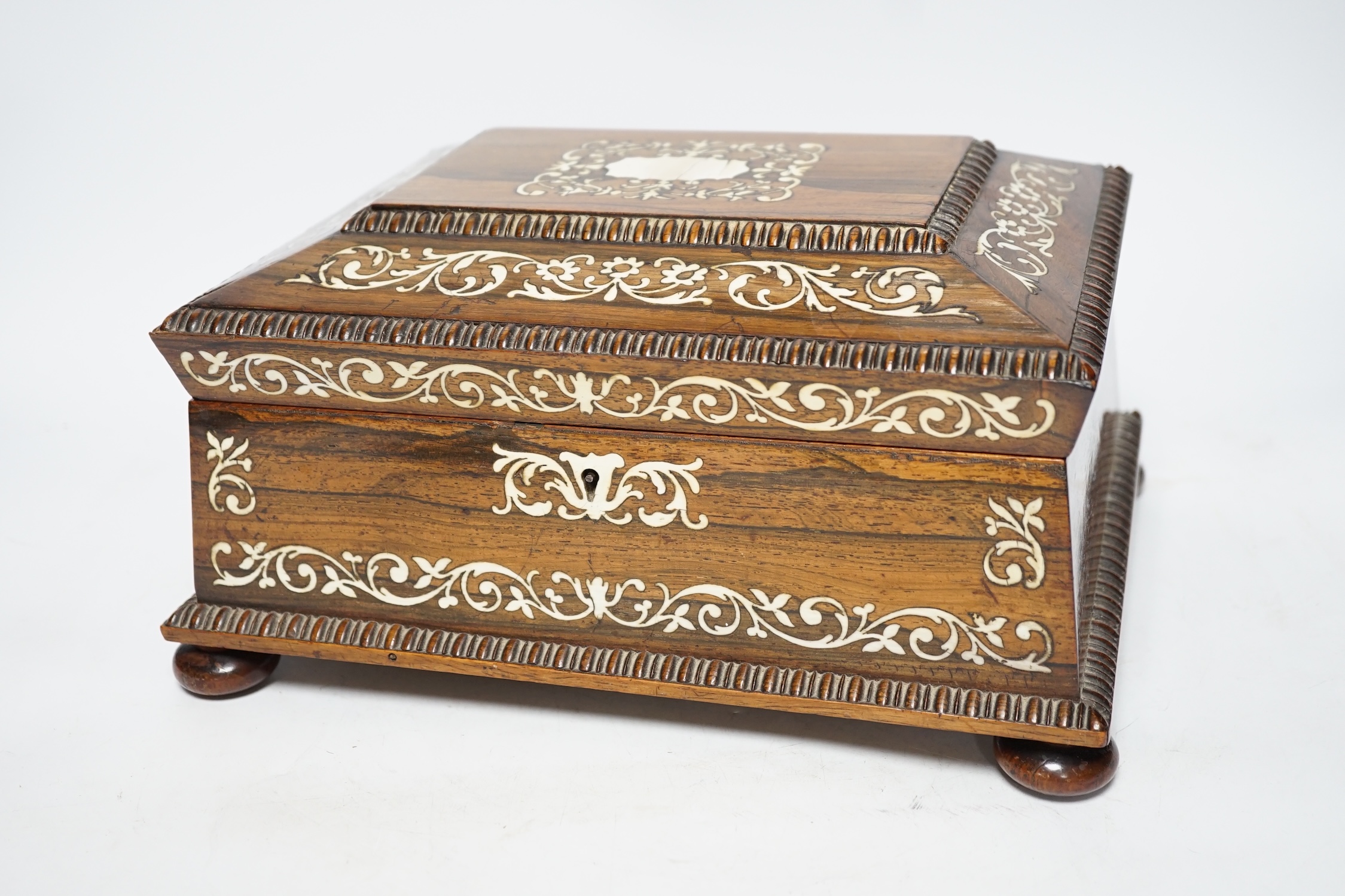 A William IV ivory inlaid rosewood work box, containing a fitted interior with lift out tray, 28.5cm wide, 22cm deep, 14.5cm high CITES Submission reference KBLFMJRS